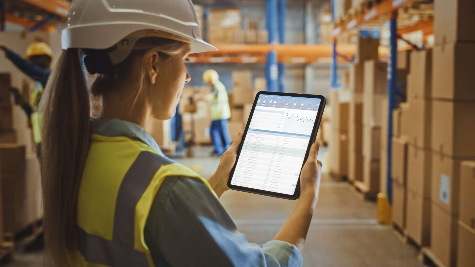 Professional Female Worker Uses Digital Tablet 